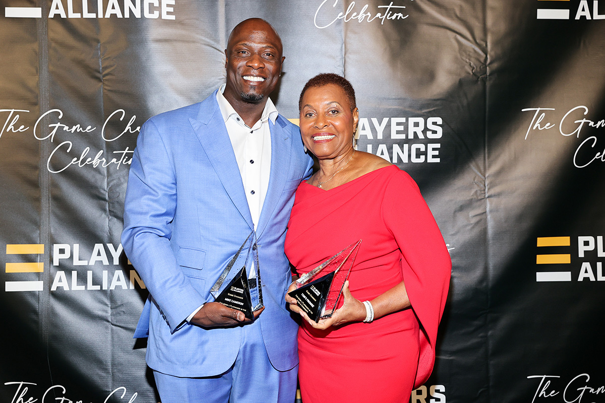 SEATTLE, WASHINGTON - JULY 09: (L-R) Mike Cameron and Maria Bartlow pose with their Game Changer award at The Players Alliance Game Changers Celebration at AQUA by El Gaucho on July 09, 2023 in Seattle, Washington. (Photo by Mat Hayward/Getty Images for The Players Alliance)