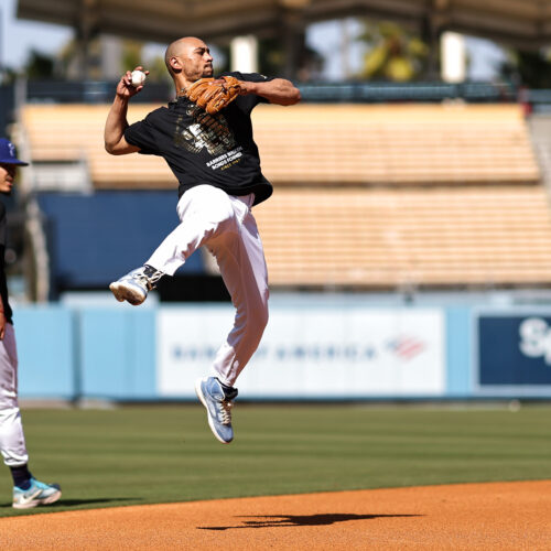 LOS ANGELES, CA - APRIL 15:   Mookie Betts #50 of the Los Angeles Dodgers throws the ball during warmups prior to the game between the Chicago Cubs and the Los Angeles Dodgers at Dodger Stadium on Saturday, April 15, 2023 in Los Angeles, California. (Photo by Michael Owens/MLB Photos via Getty Images)