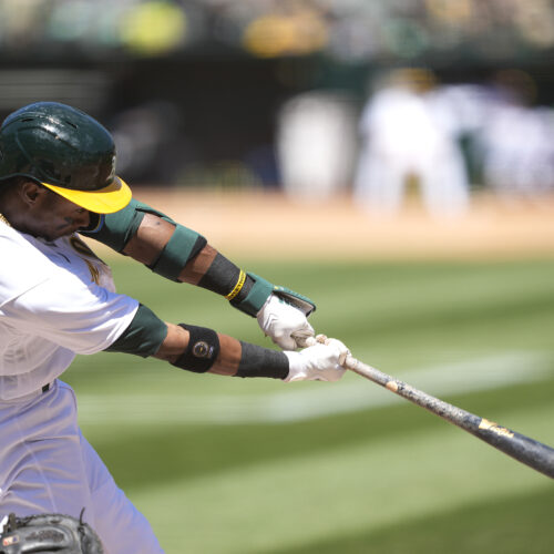 OAKLAND, CALIFORNIA - APRIL 15: Esteury Ruiz #1 of the Oakland Athletics hits an rbi single scoring Aledmys Diaz #12 against the New York Mets in the bottom of the second inning at RingCentral Coliseum on April 15, 2023 in Oakland, California. All players are wearing the number 42 in honor of Jackie Robinson Day. (Photo by Thearon W. Henderson/Getty Images)